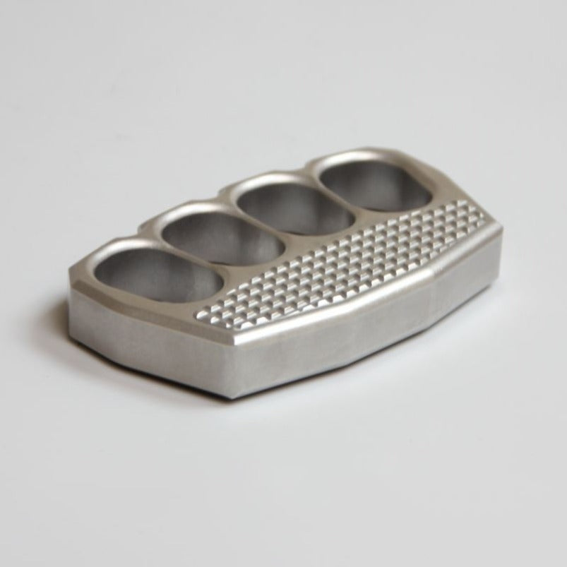 Non-slip steel knuckle duster detail showing machined edges