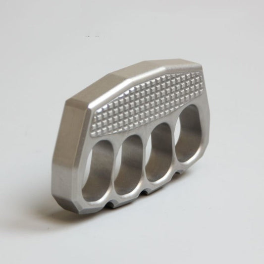 Non-slip stainless steel knuckle duster with textured strike face front view