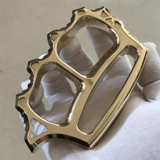 Solid thickened brass knuckle duster with window breaker front view