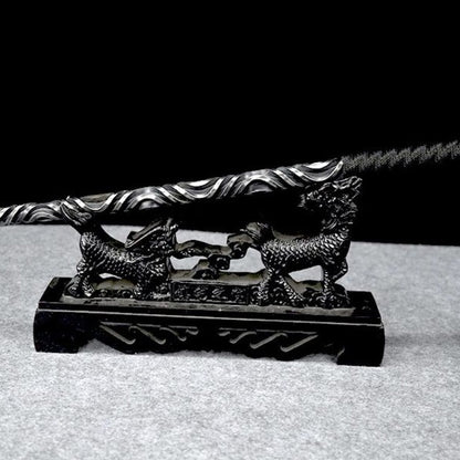 Solid one-piece forged martial arts hand stick on dual kiilin stand