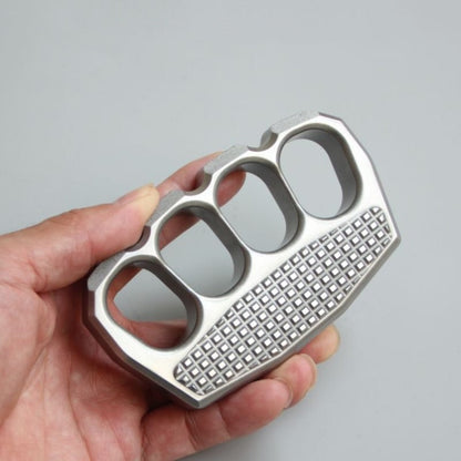 Side profile of non-slip steel knuckle duster showing grid texture