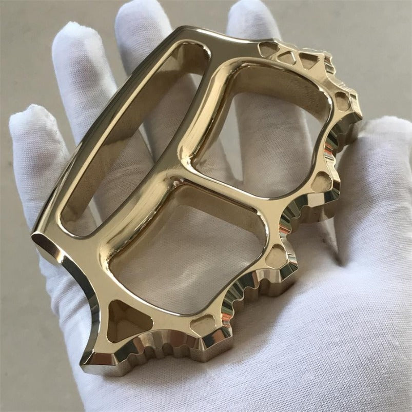 Side profile of thickened brass two finger knuckle duster