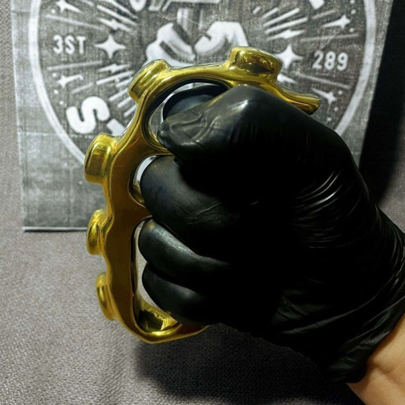 Side profile of solid brass four finger knuckle duster