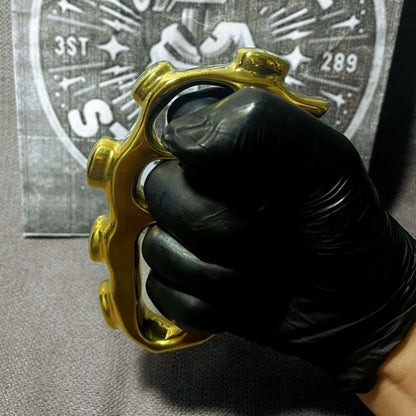 Side profile of solid brass four finger knuckle duster