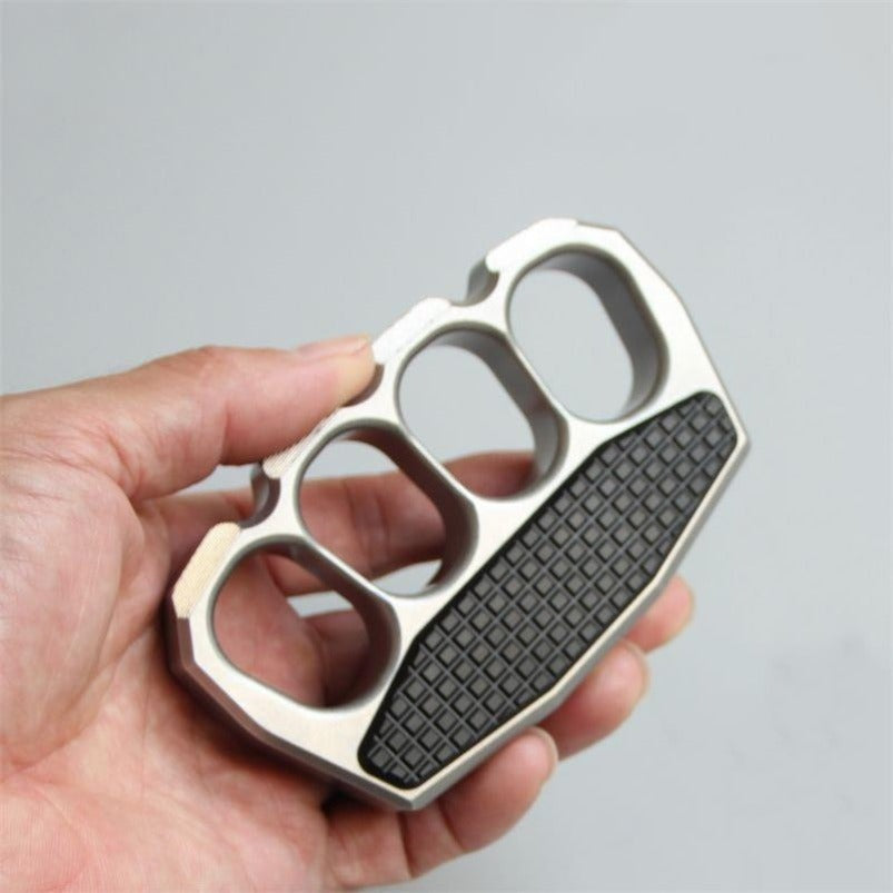 Close-up of magnetic clip on stainless steel knuckle duster