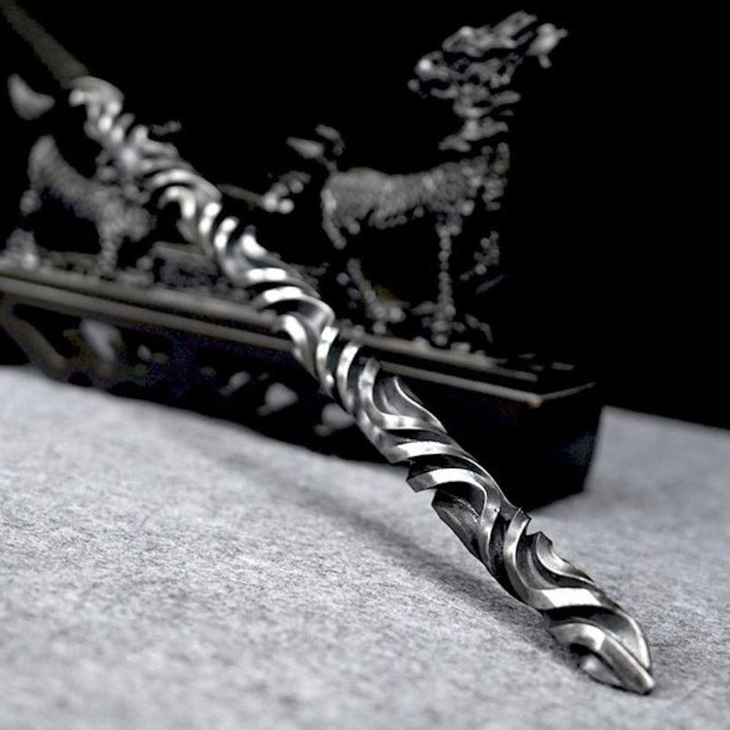 Hand stick with black tassel and decorative end cap