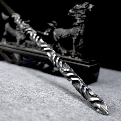 Hand stick with black tassel and decorative end cap