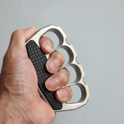 Window breaker tip detail on magnetic steel knuckle duster
