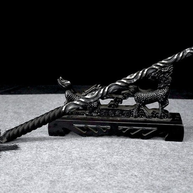 Full length view of martial arts hand stick on stand