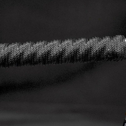Hand stick end cap and tassel attachment detail