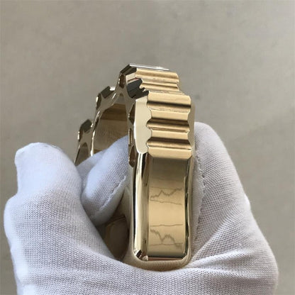Brass knuckle duster lifestyle shot on light surface