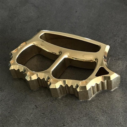 Full view of thickened brass knuckle duster with mirrored finish